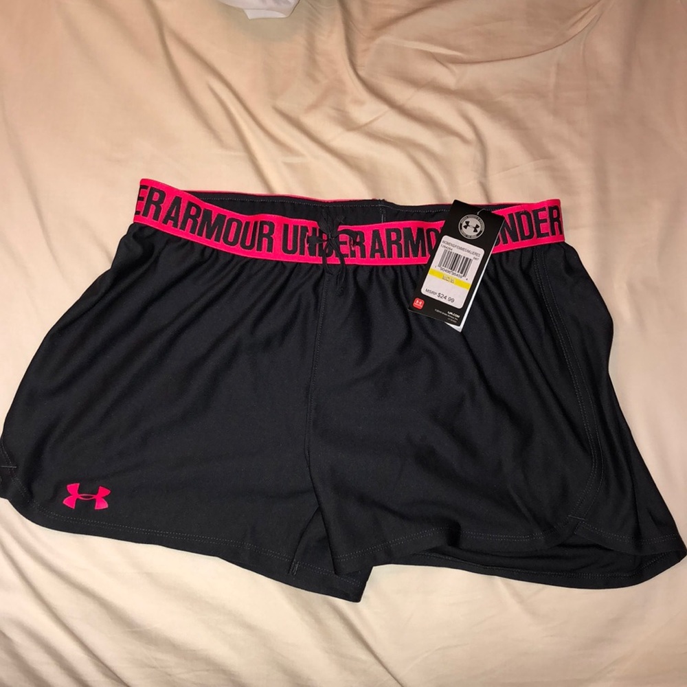 Under Armour running shorts, size medium